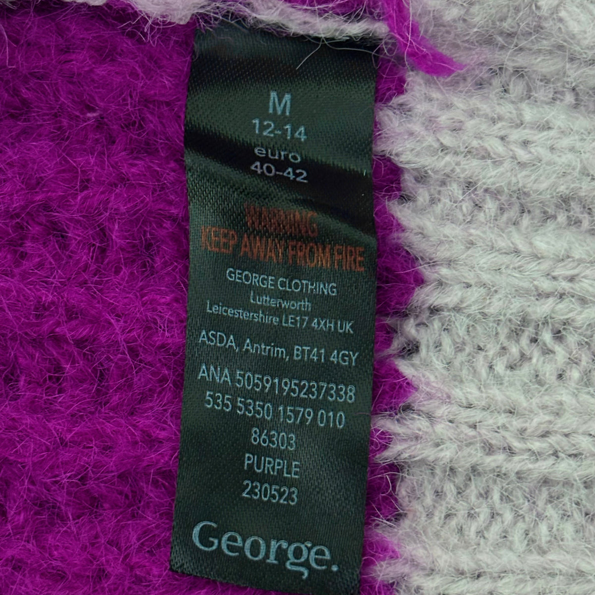 George purple and grey sweater size M label
