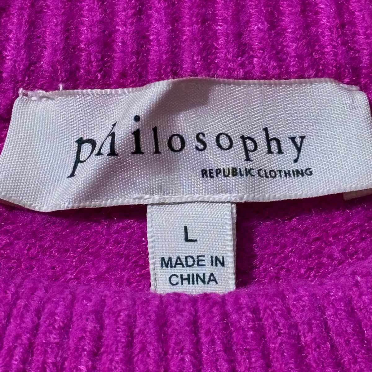 Philosophy Republic Clothing purple sweater label