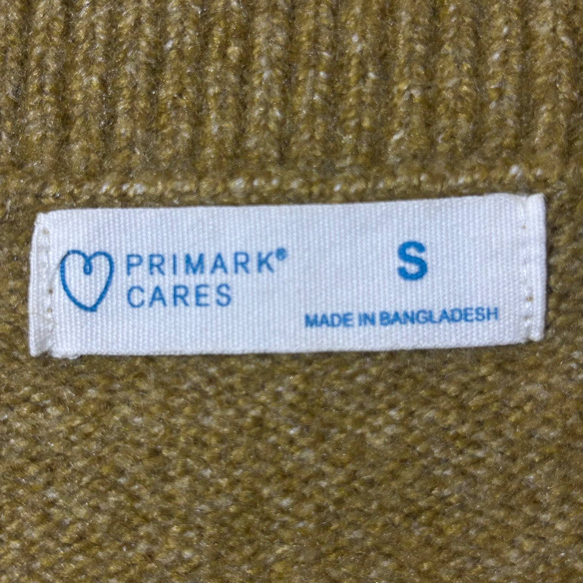 Primark olive tan sweater size S label