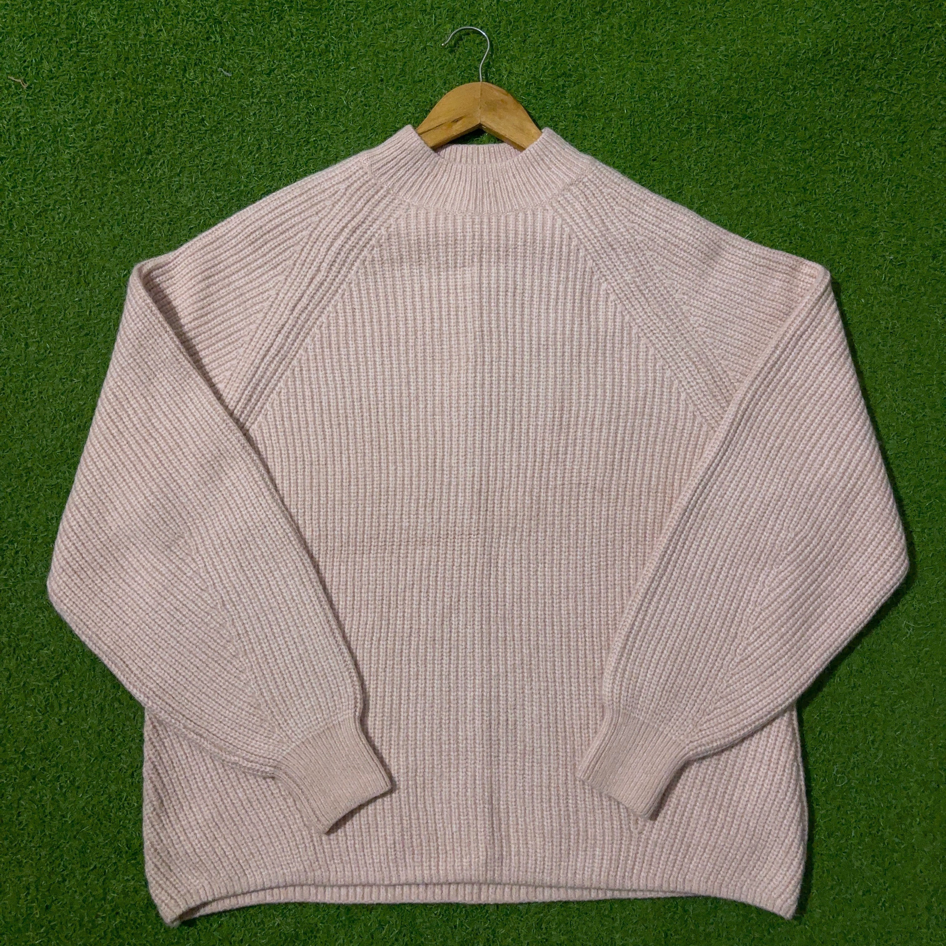 Blush pink ribbed mock-neck sweater by H&M