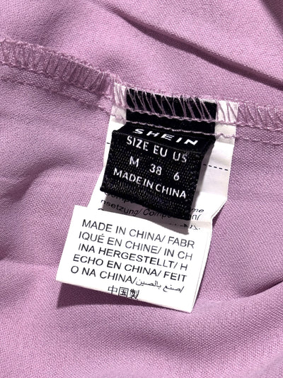 SHEIN label showing size M, EU 38, US 6 - alternate view