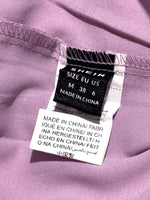 SHEIN label showing size M, EU 38, US 6