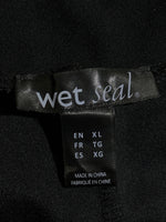 Wet Seal size XL label inside black trousers