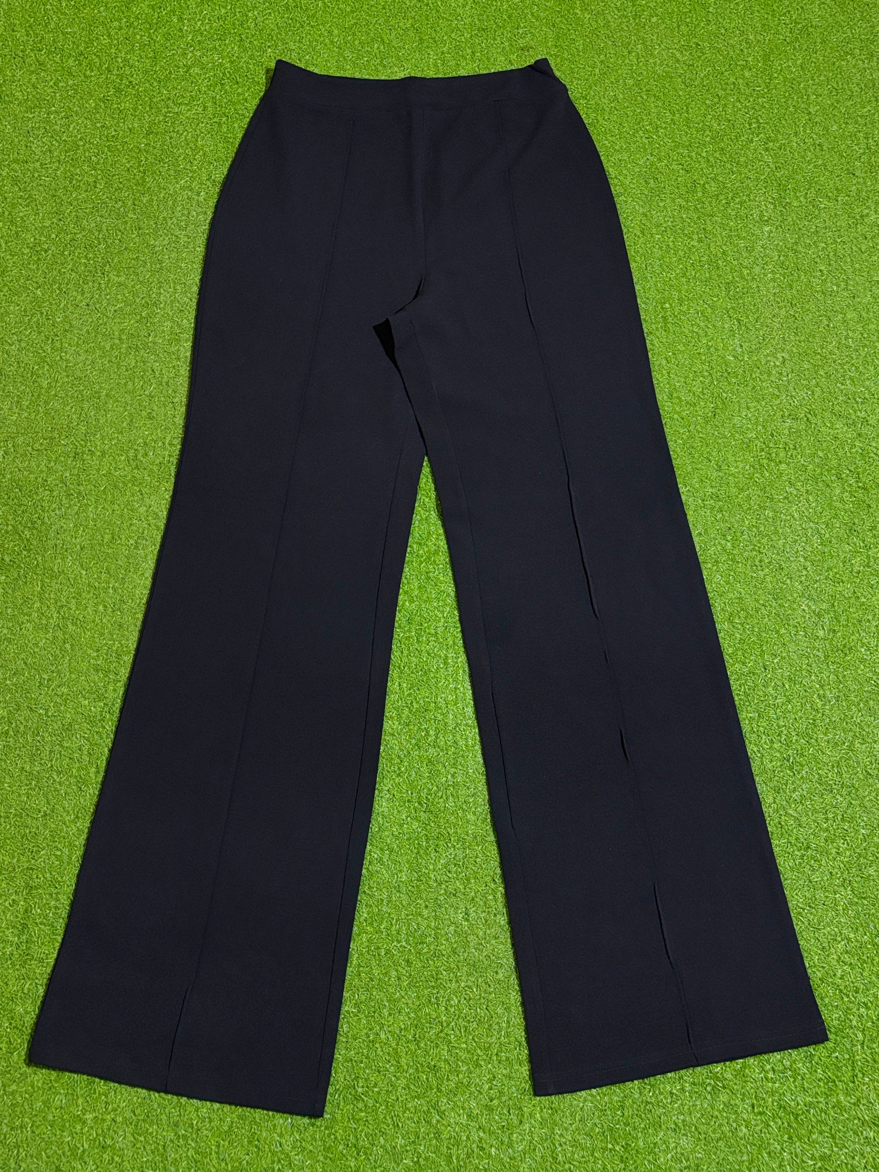Black high-rise wide-leg trousers laid flat