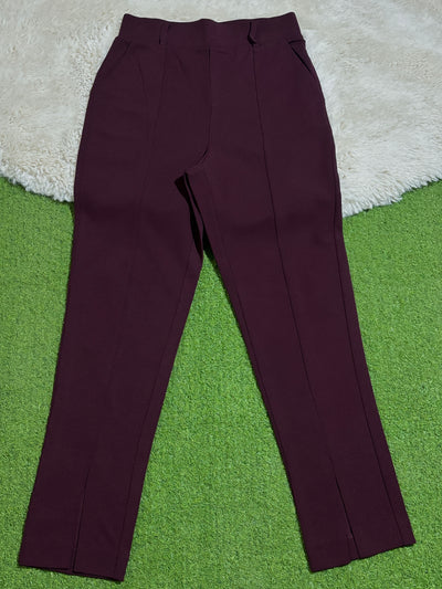 Burgundy high-rise straight-leg trousers laid flat