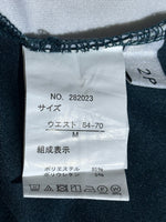 Size M label with polyester and polyurethane composition