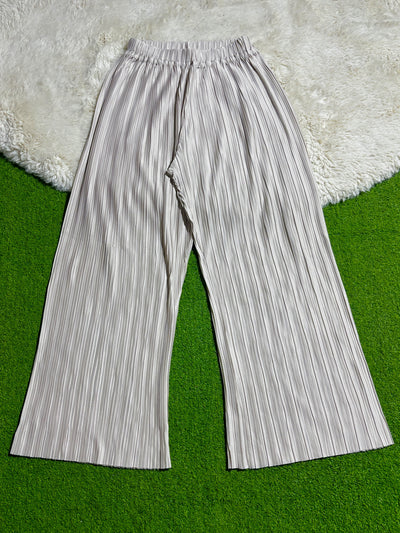 Silver pleated wide-leg trousers with gathered waistband laid flat