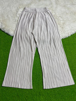 Silver pleated wide-leg trousers with gathered waistband laid flat