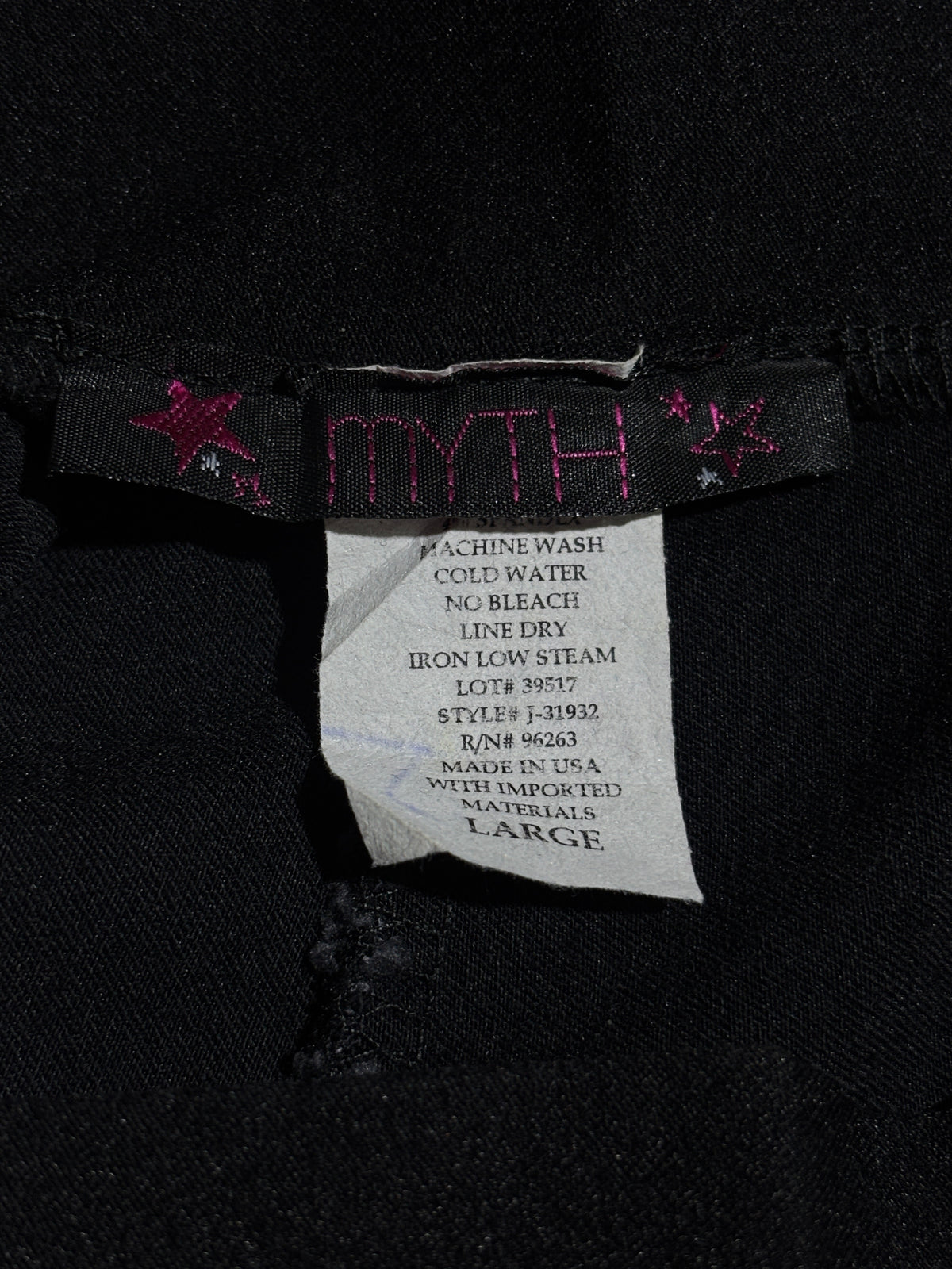 TRUTH label and Large size label inside trousers