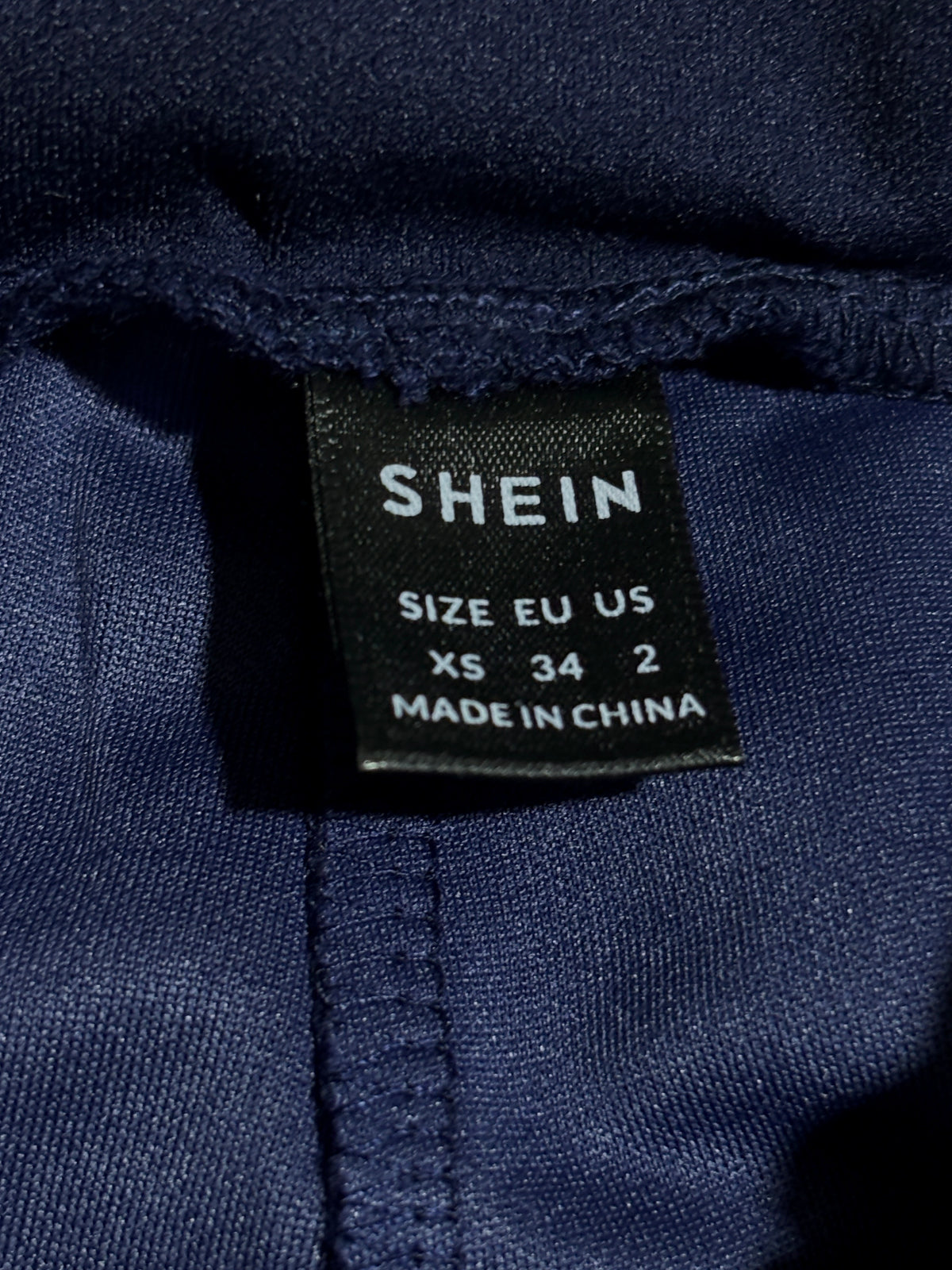 SHEIN size XS, EU 34 and US 2 label inside trousers