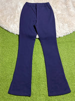 Navy blue high-rise flared trousers laid flat