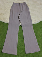 High-rise straight-leg pants with side pockets laid flat