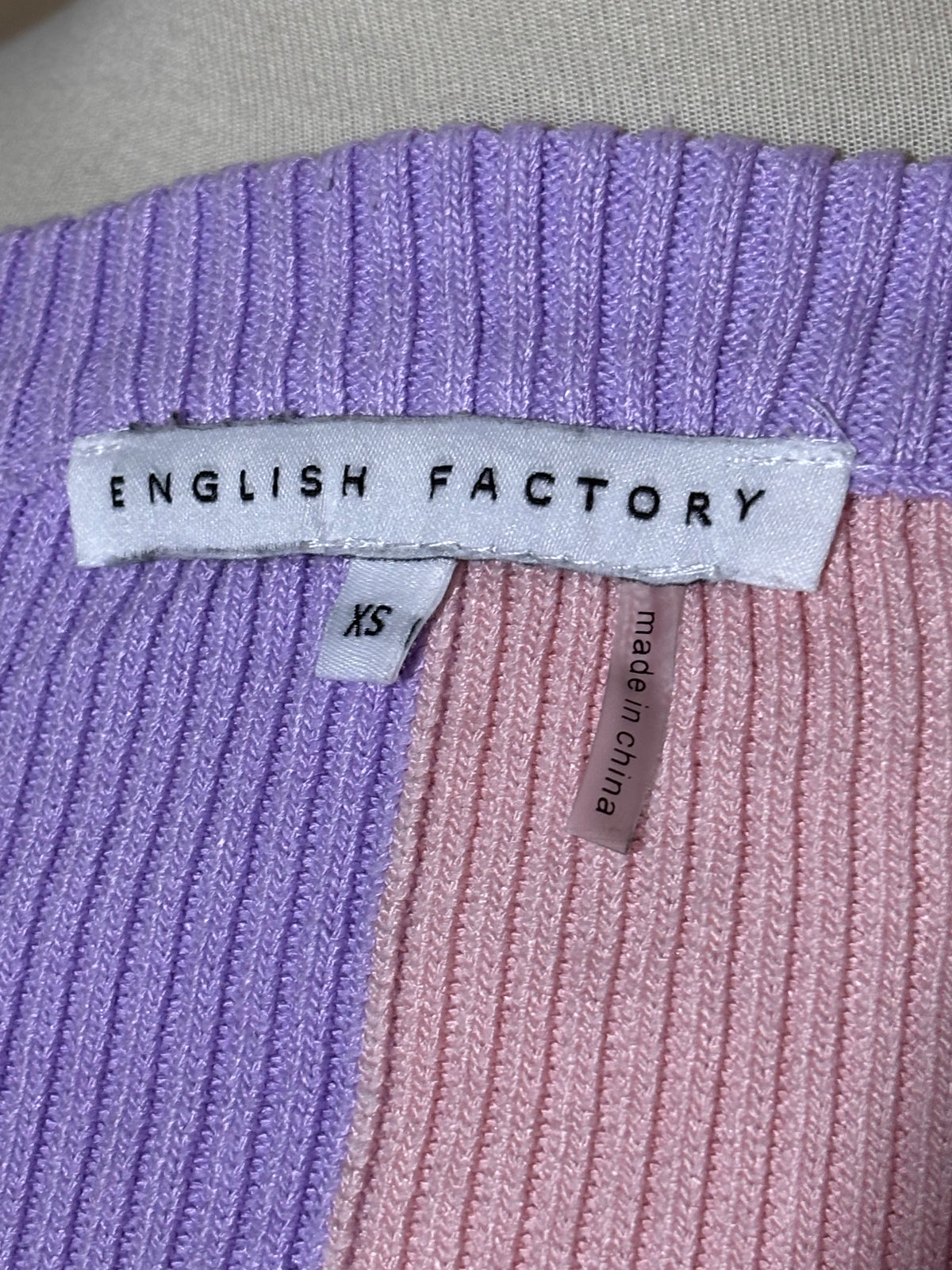 English Factory XS label on color-block crop top