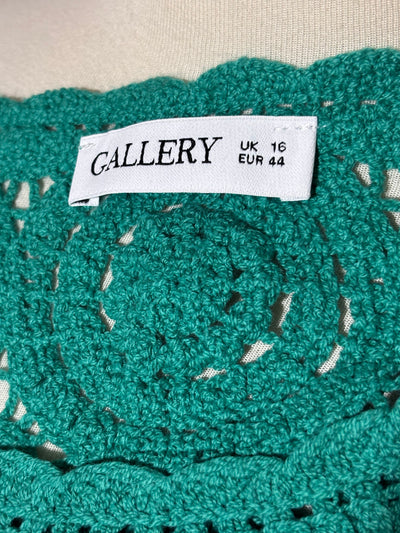 Gallery label UK 16 EUR 44 on teal top - alternate view