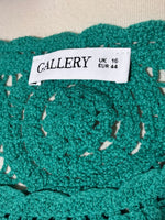 Gallery label UK 16 EUR 44 on teal top