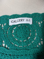 Gallery label UK 14 EUR 42 on teal top