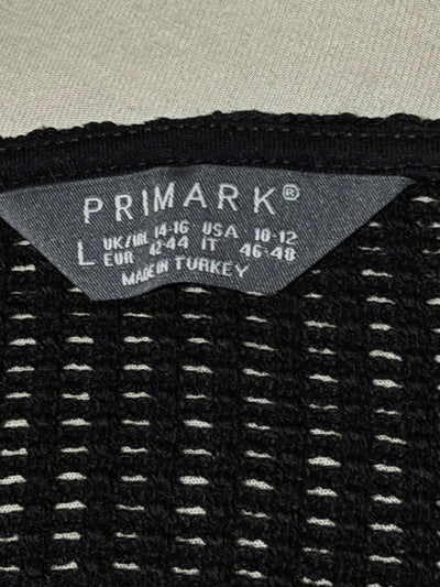 Primark size L label on black openwork crop top - alternate view