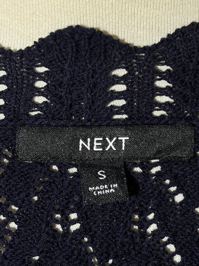 Next size S label on black vest - alternate view