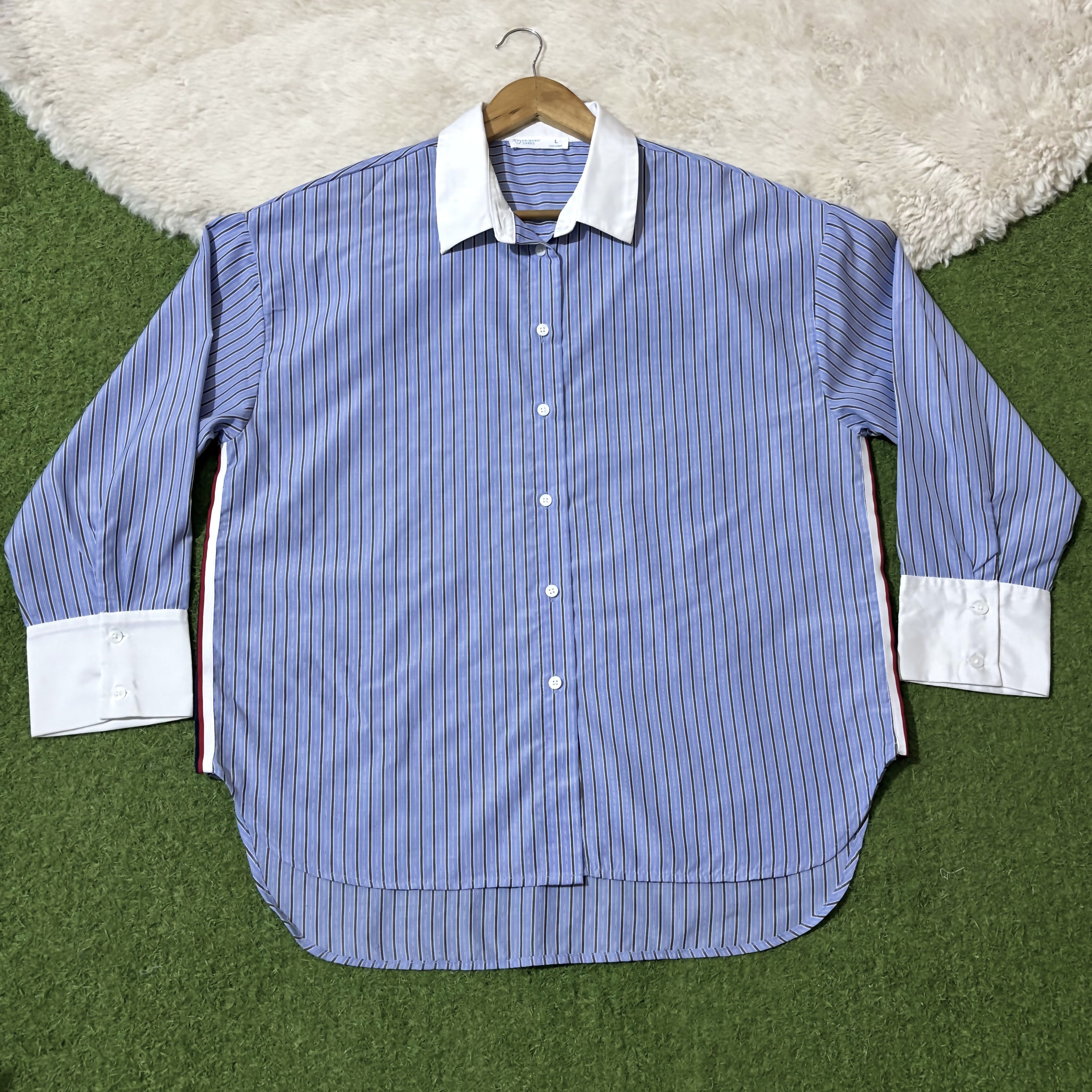 Blue striped drop-shoulder shirt with white collar and wide white cuffs