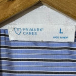 Primark Cares label showing size L