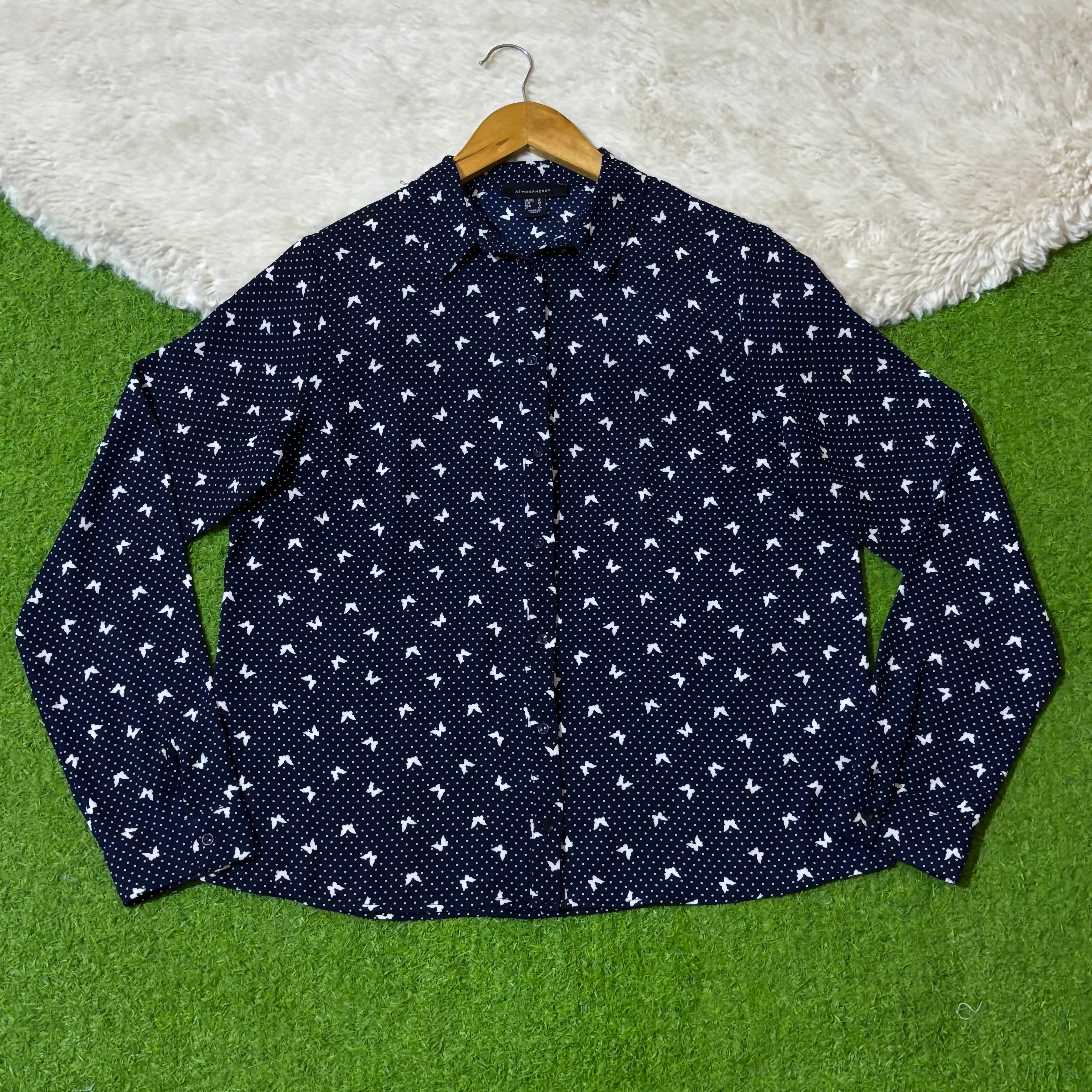 Navy blue and white butterfly polka dot button-front shirt
