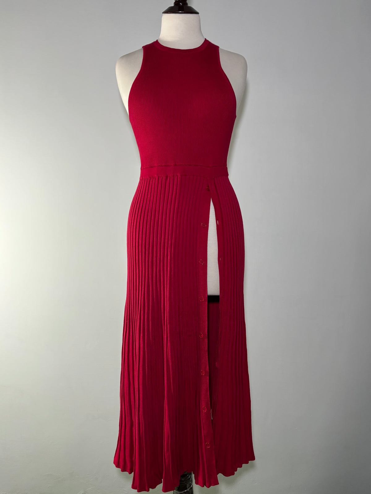 Red maxi dress with skirt buttons open to show the opening
