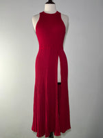 Red maxi dress with skirt buttons open to show the opening