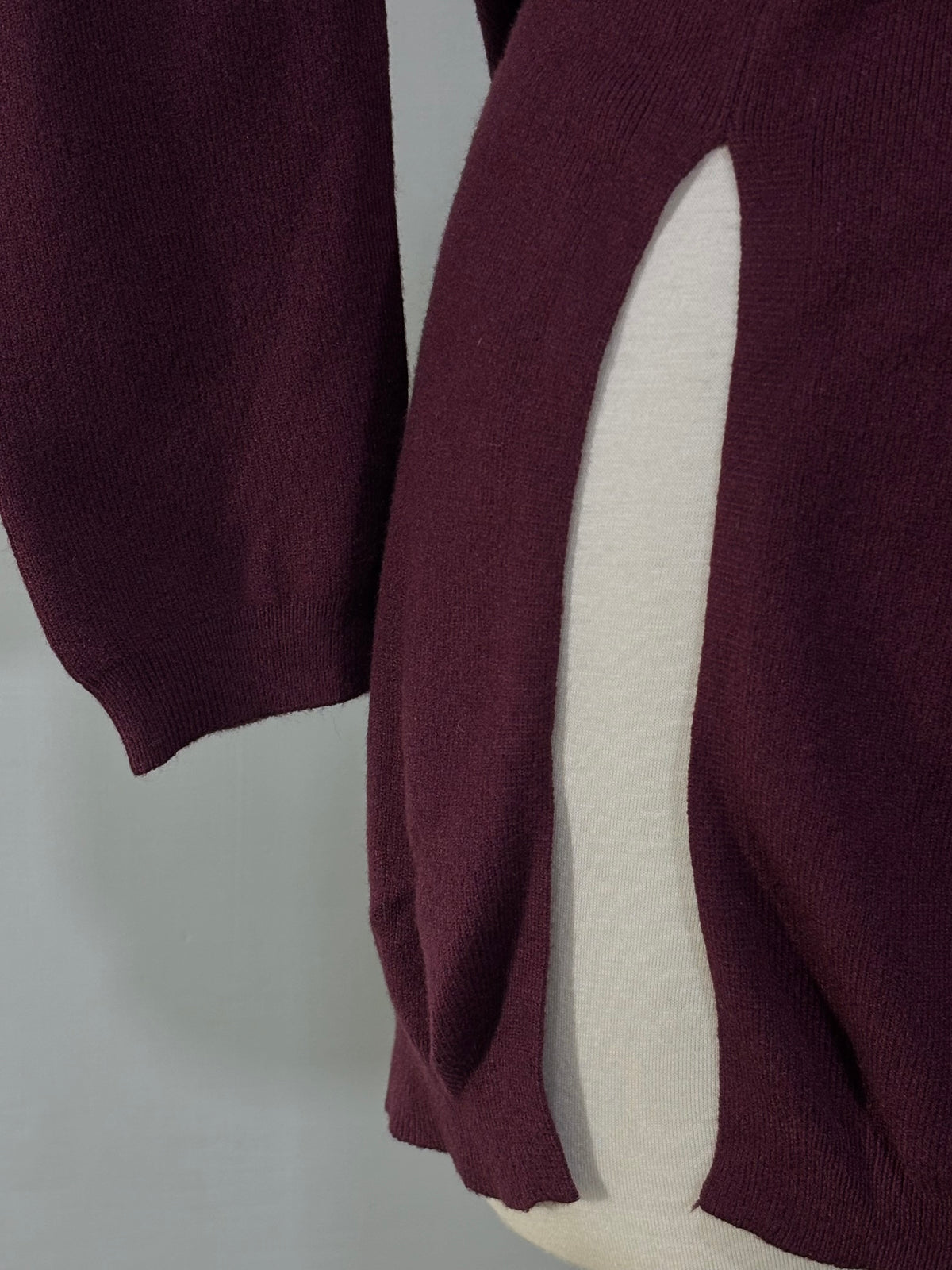 Side slit and sleeve cuff on burgundy dress