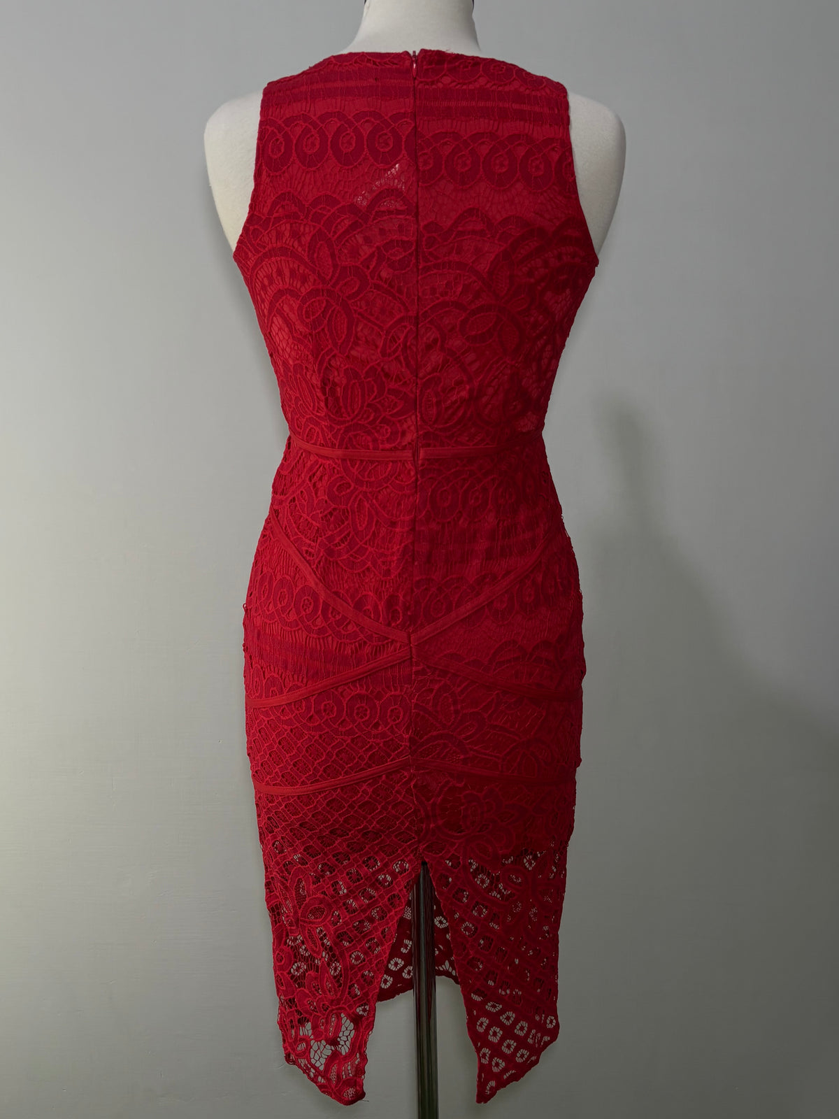 Back view of red patterned dress with back zip and slit