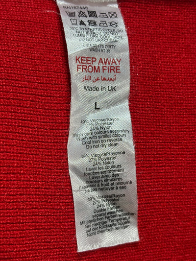 Fabric label showing 49% viscose 27% polyester and 24% nylon - alternate view