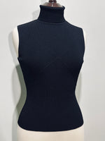 Black fitted sleeveless turtleneck top front view