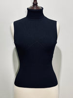 Black turtleneck top subtle geometric detailing