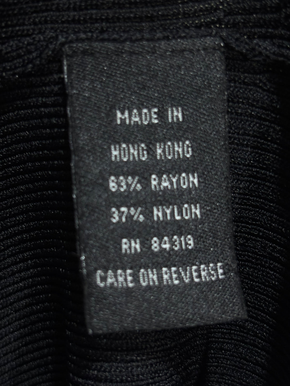 Fabric label confirming 63% rayon and 37% nylon