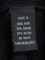 Fabric label confirming 63% rayon and 37% nylon