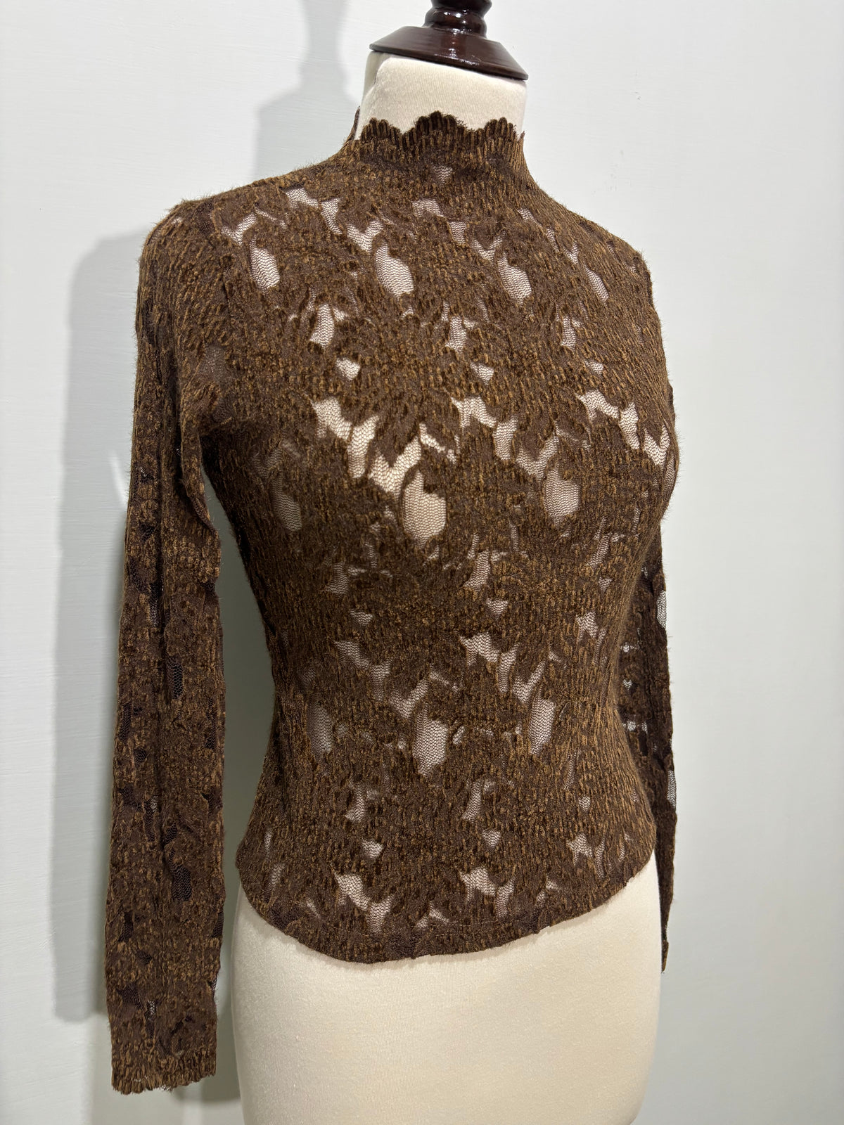 Brown floral top scalloped neckline and patterned detail