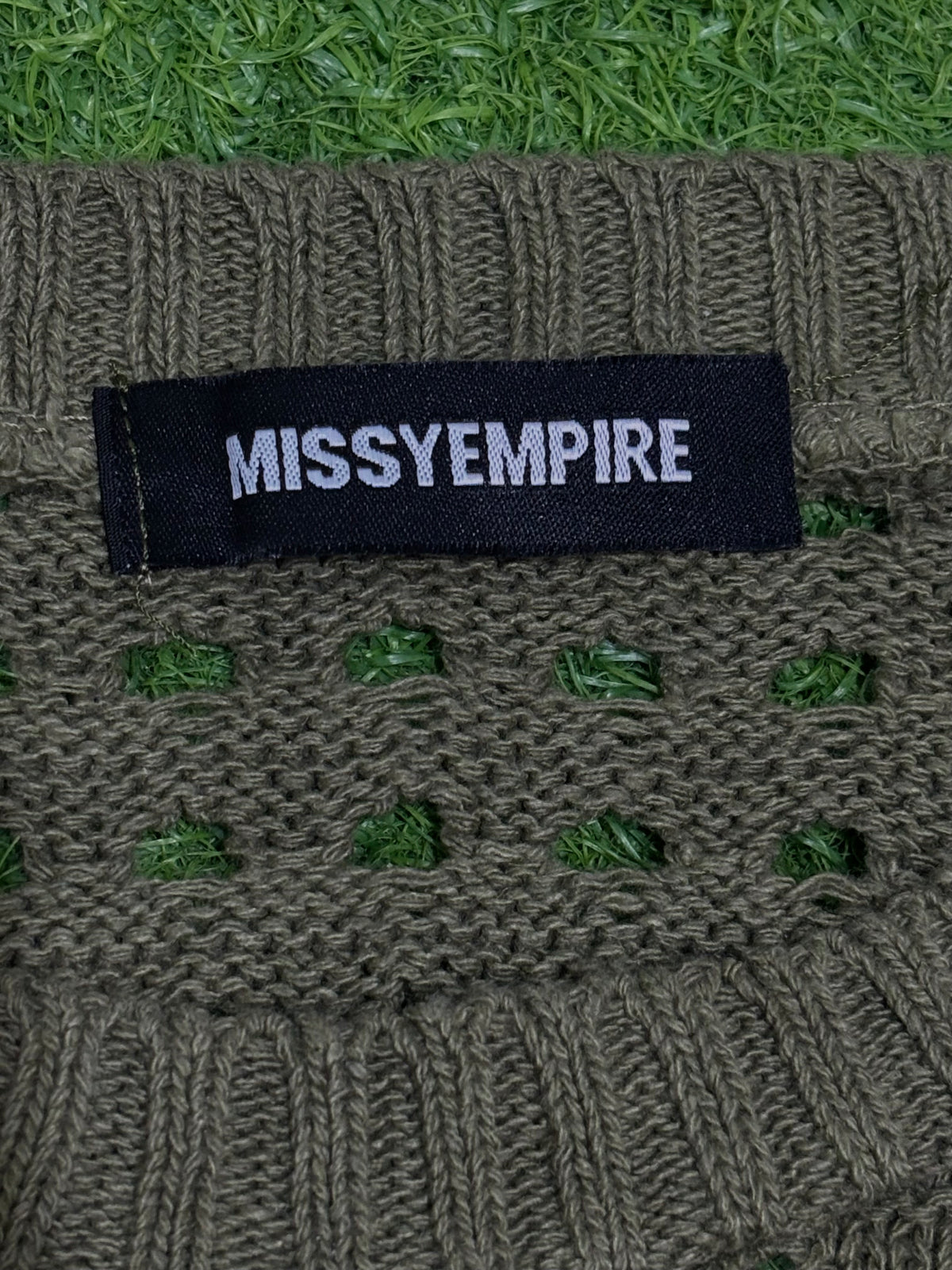 Missy Empire brand label and openwork detail