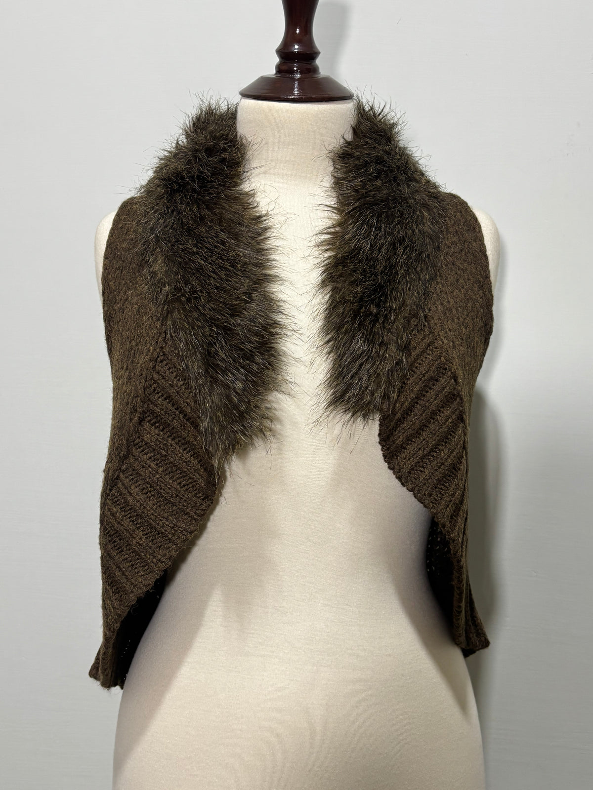Chocolate brown open-front sleeveless vest with faux-fur collar