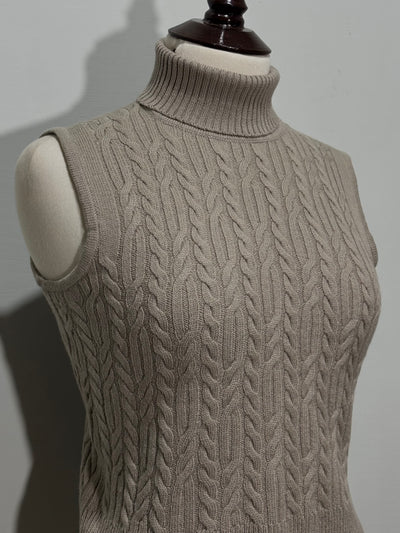 Beige sleeveless turtleneck top cable detailing