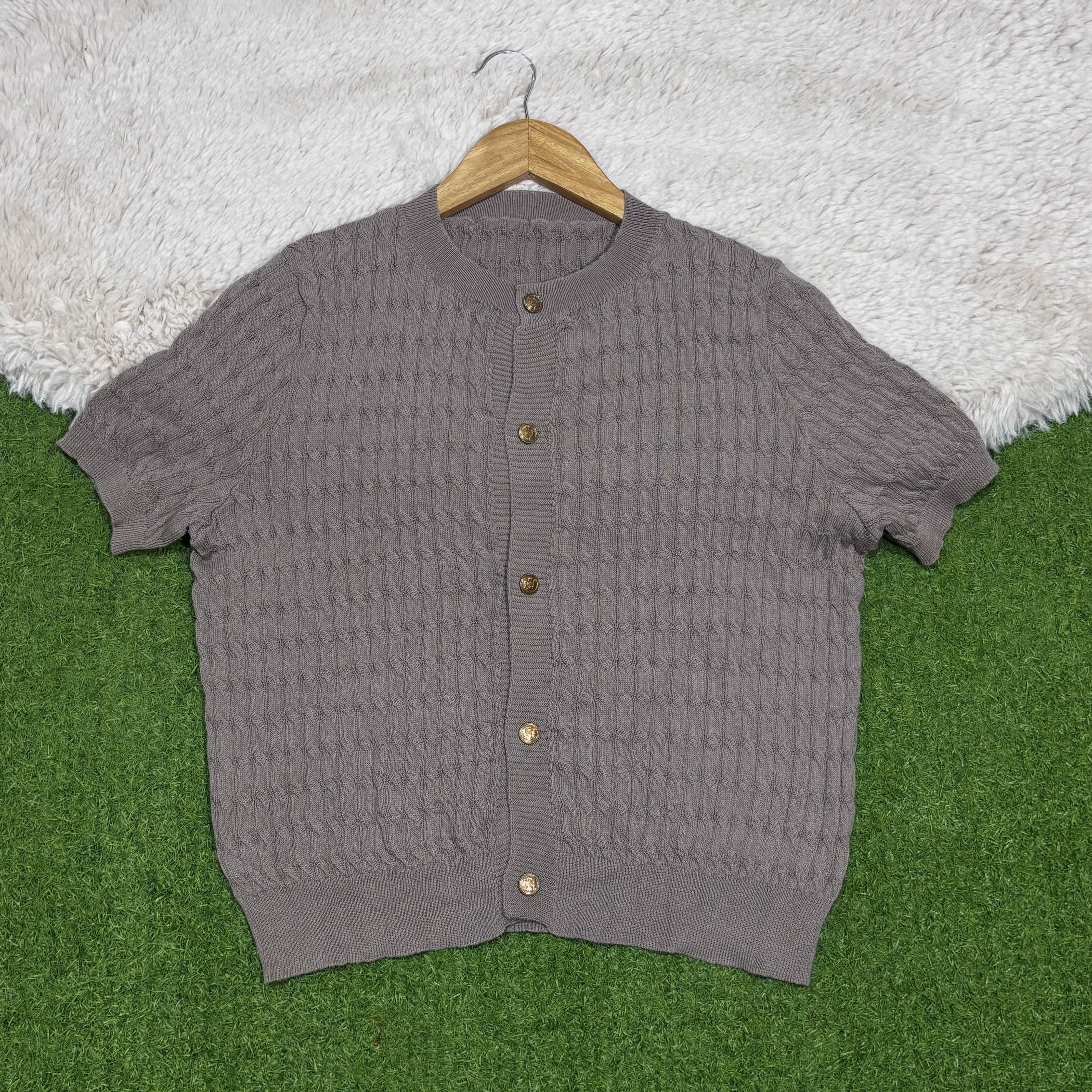 Grey textured short-sleeve button-front top with round neckline