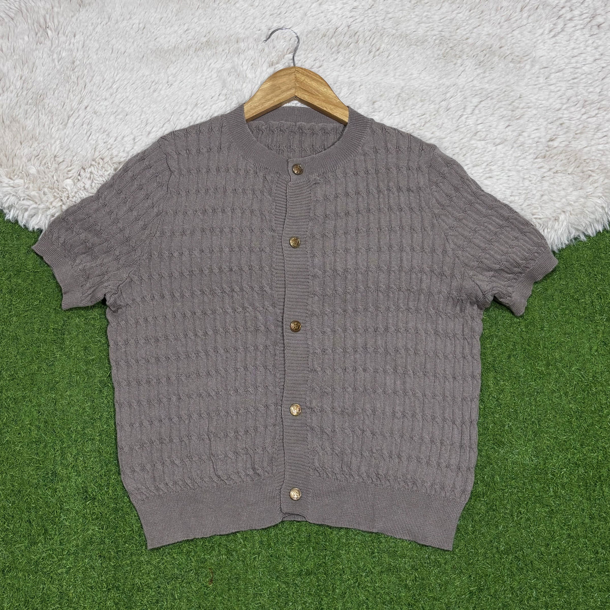Grey textured short-sleeve button-front top with round neckline