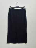 Black straight midi skirt back view with slit