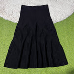Black ribbed flared winter midi skirt with angled panel detail