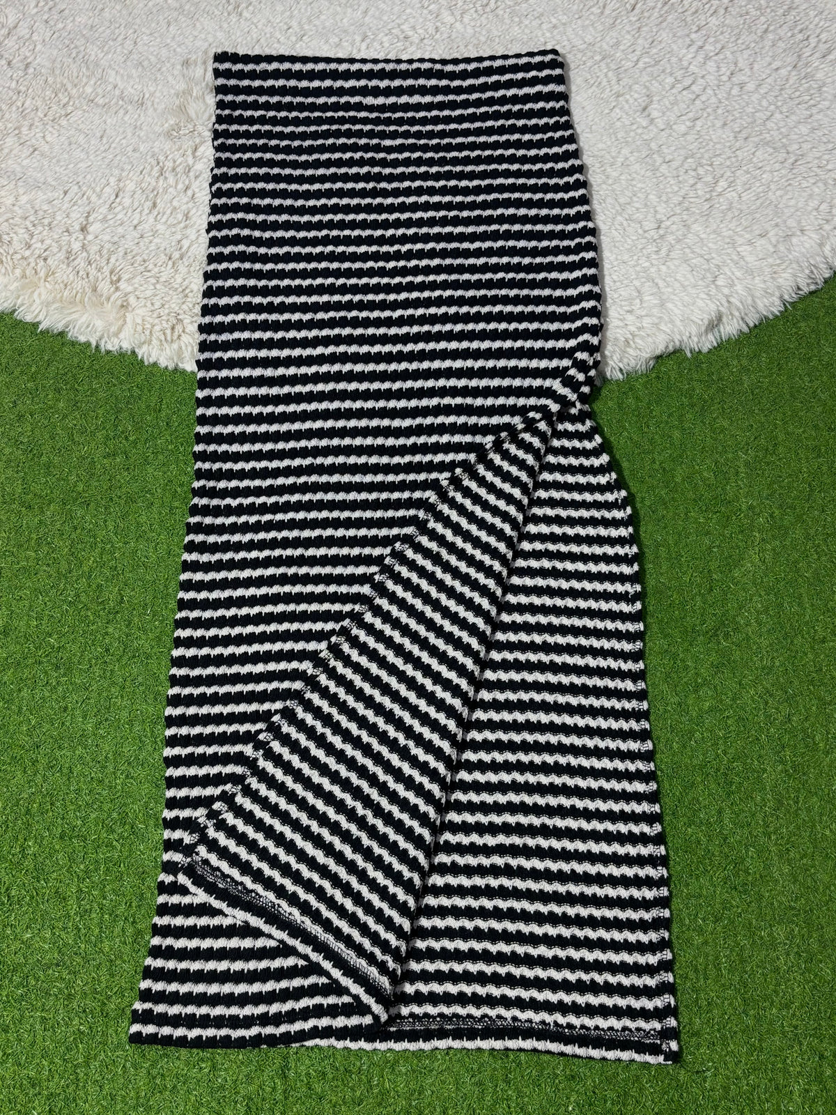 Black and white striped skirt showing fabric detail