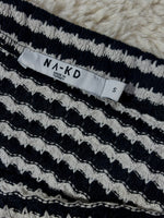 NA-KD skirt label showing size S