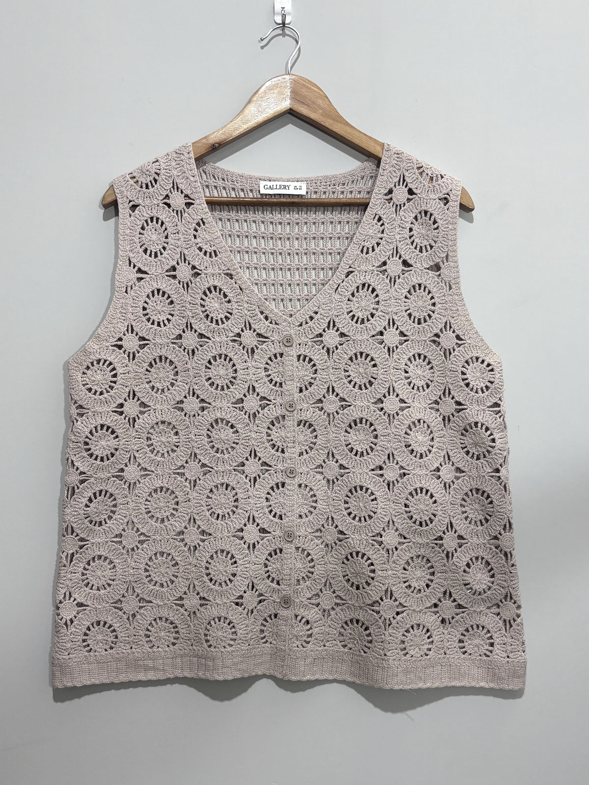 Taupe circular openwork V-neck button-front sleeveless top