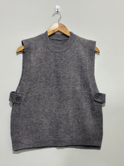 Grey sleeveless round-neck winter top with side-button tabs