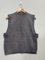 Grey sleeveless round-neck winter top with side-button tabs