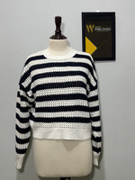 Navy blue and cream striped openwork drop-shoulder top on mannequin
