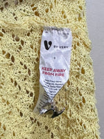 Light yellow openwork button-front top with puff sleeves and ruffled edges