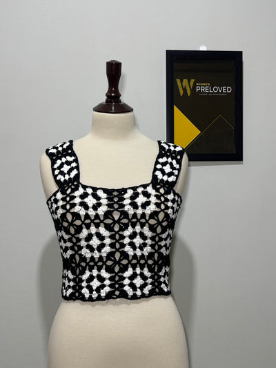 Black and white floral openwork square-neck crop top on mannequin